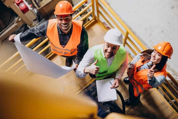 Team of workers in safety equipment collaborating on site